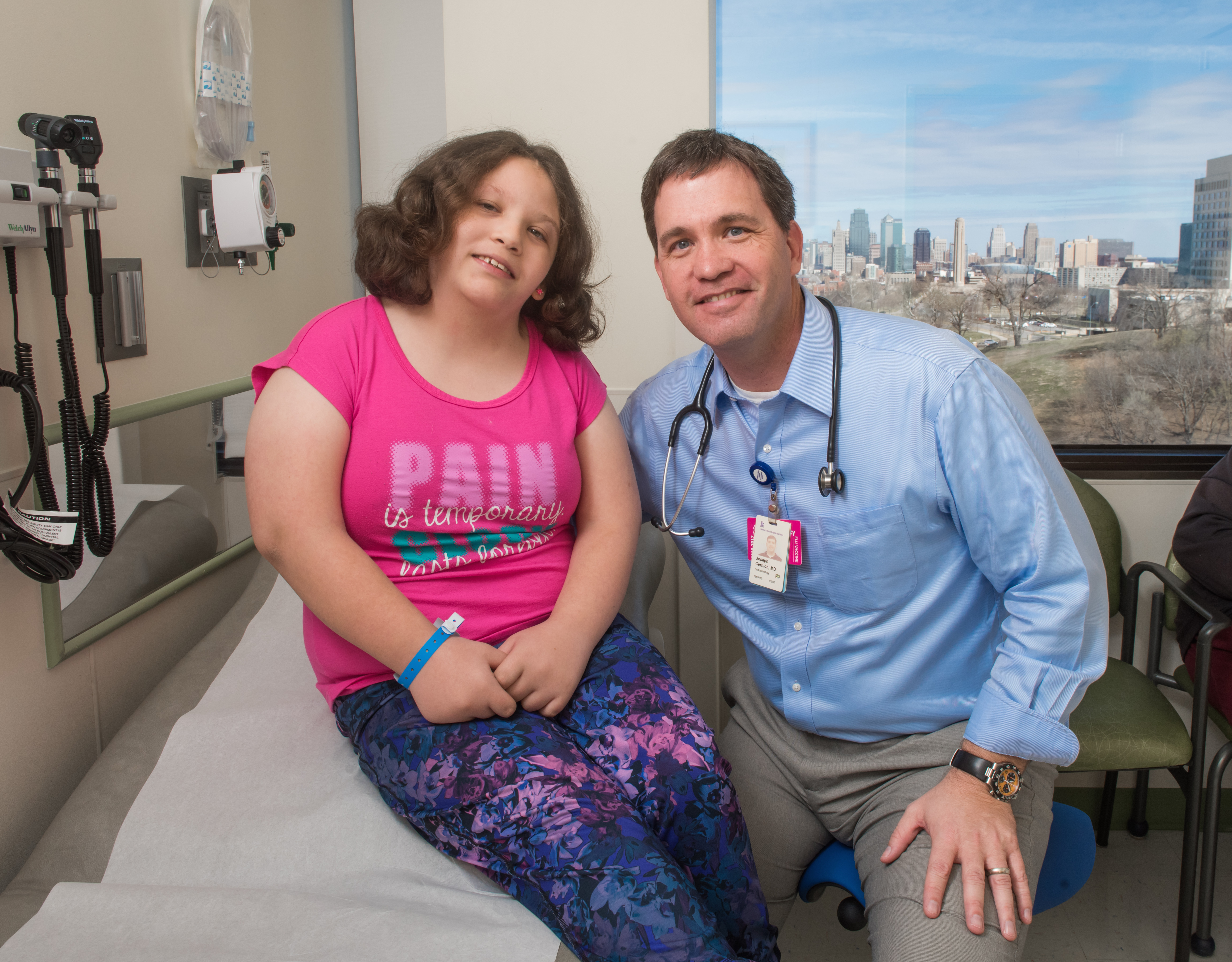 Dr Cernich with patient in exam room